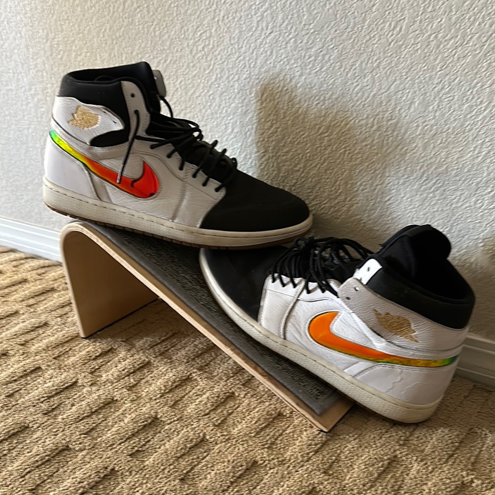 Nike High-Top Sneakers with Orange Swoosh